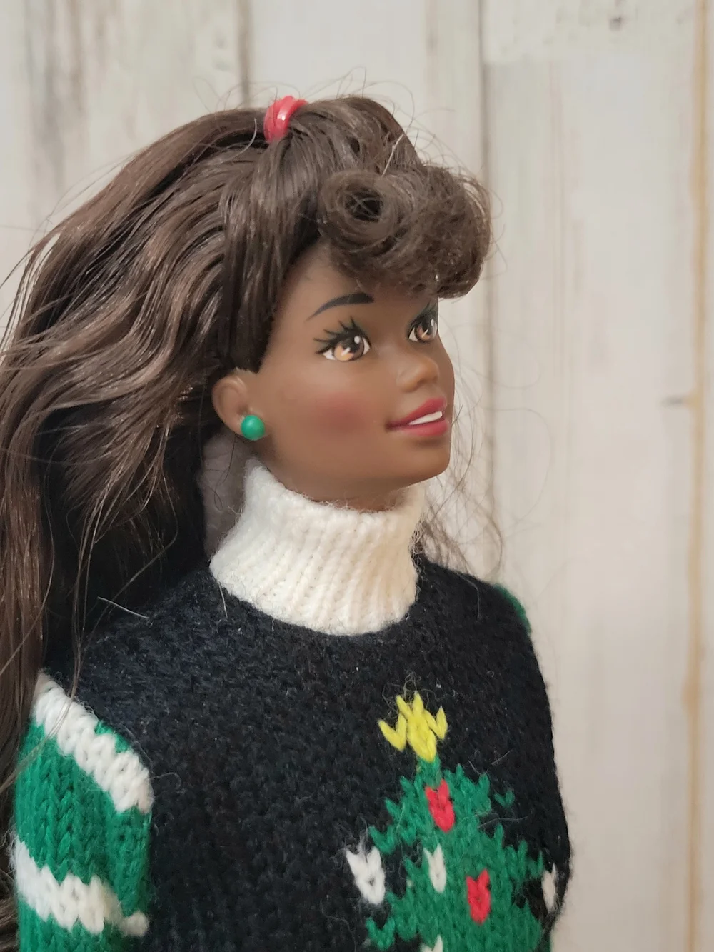 Brunette Doll with Green Stud Earrings and White Turtleneck